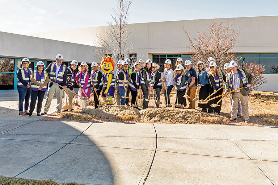 San Juan College (SJC) President Dr. Toni Hopper Pendergrass along with SJC Board of Trustees members, President’s Cabinet members and representatives from Jayne’s Corporation gather with Blaze and other dignitaries to break ground on the new Student Health Center, February 23, 2024.