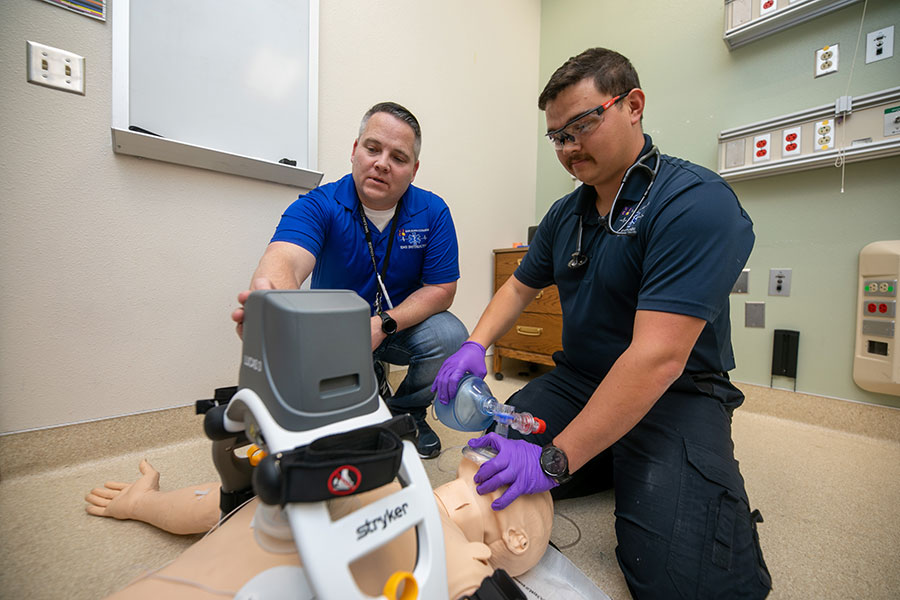 students in a lab for the paramedic certificate program at SJC.