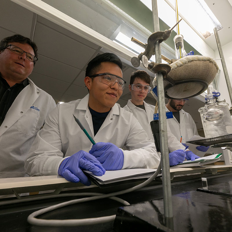 SJC students in their science lab class.