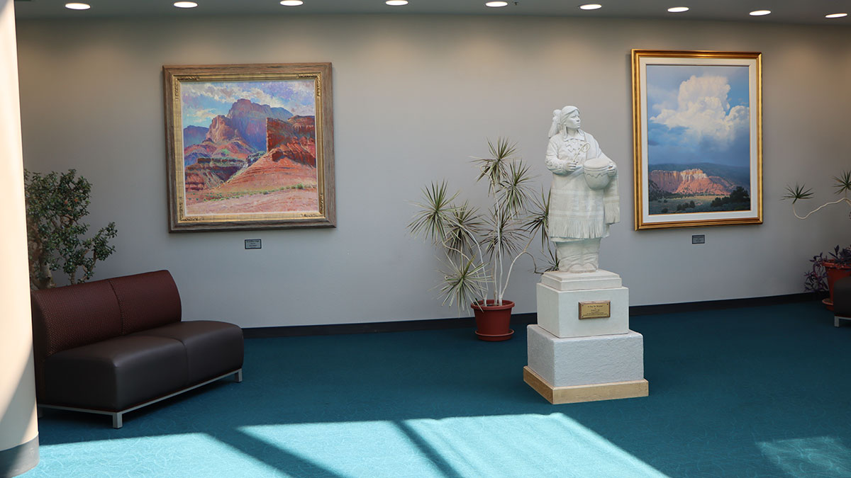 Statue inside of the Henderson Fine and Performing Arts Center