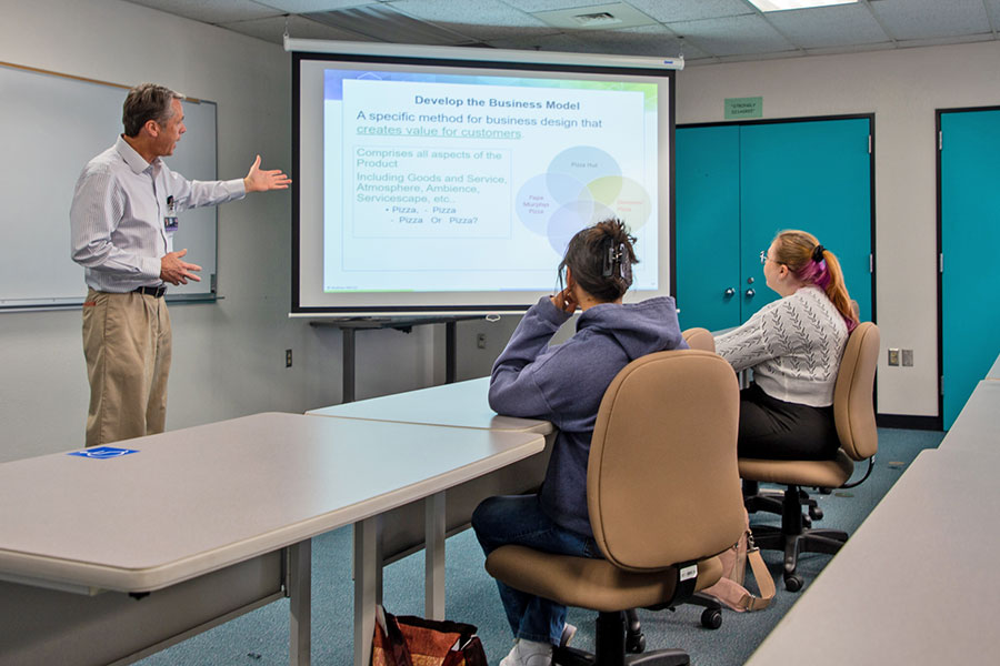Professor Maloney teaching a Business Administration course at SJC Main Campus