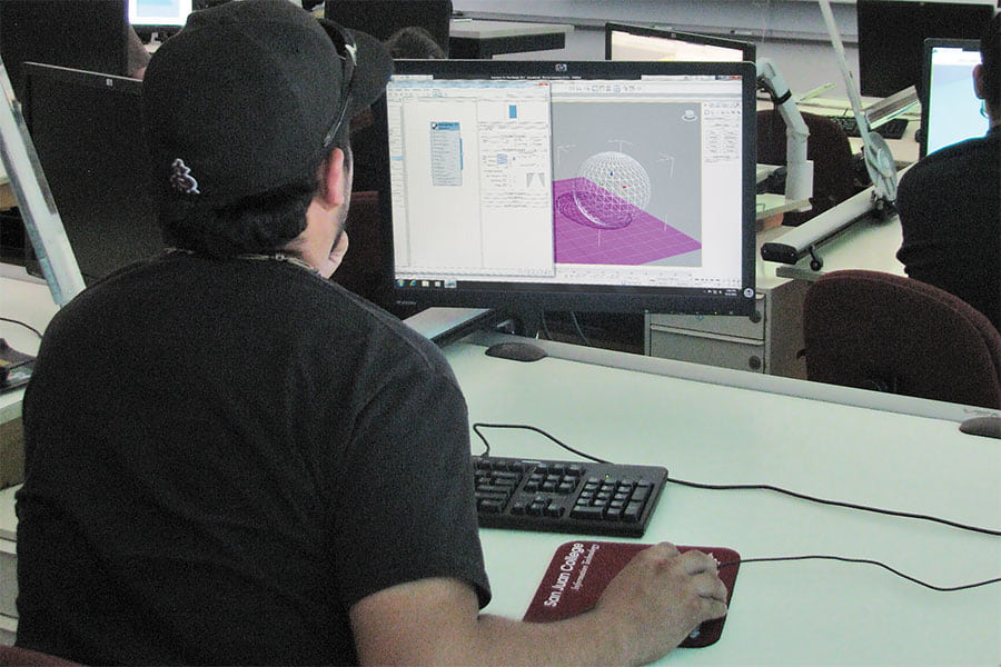 SJC student in the Drafting Certificate course working on a project at a computer