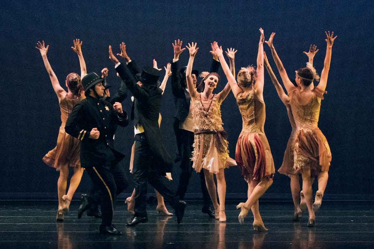 Group of Ballet dancers with their hands in the air