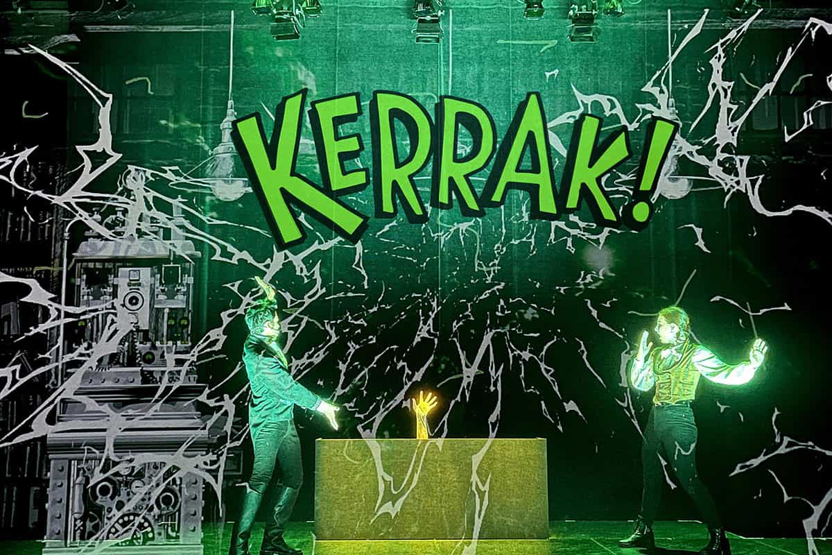 Live Frankenstein play with KERRAK! and lighting flashing in the background