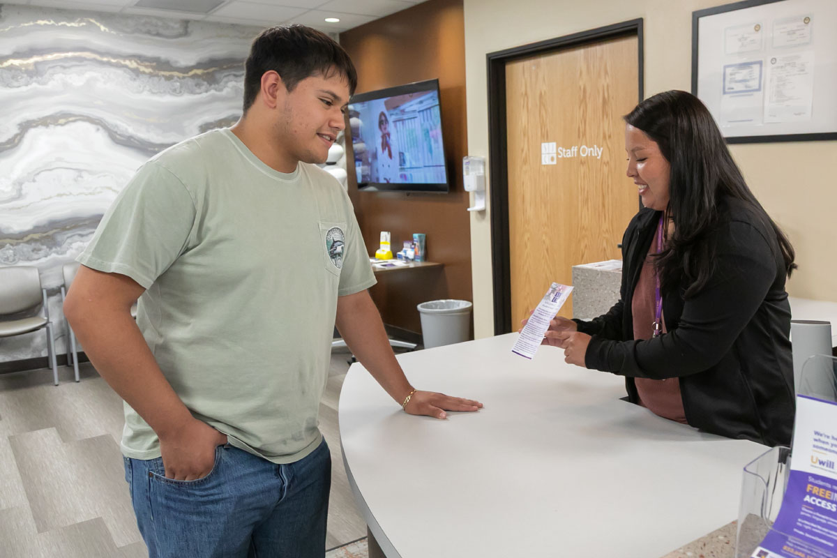 SJC student at the counter of the Student Health Center on the San Juan College Campus.