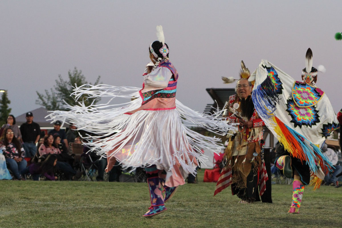 Native American performing the Spring gord dance in traditional clothing