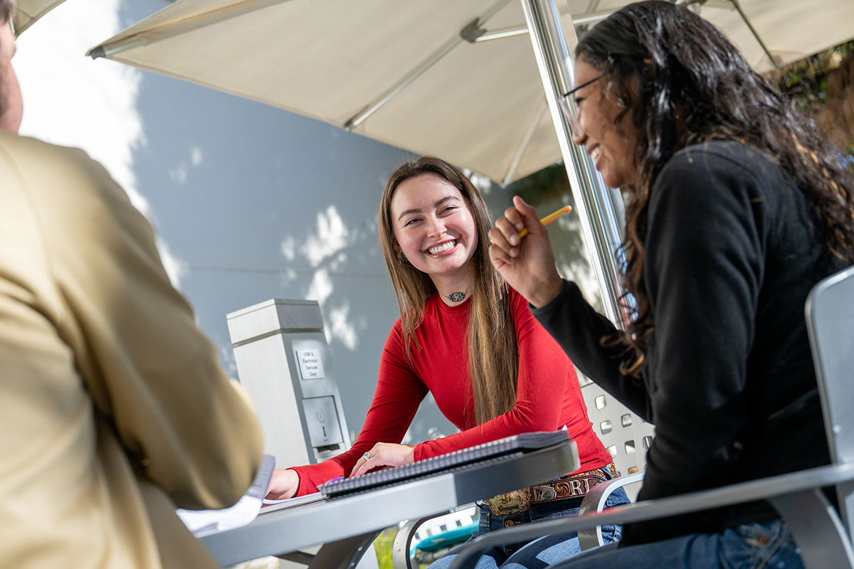 Group of SJC students having a discussion on main campus