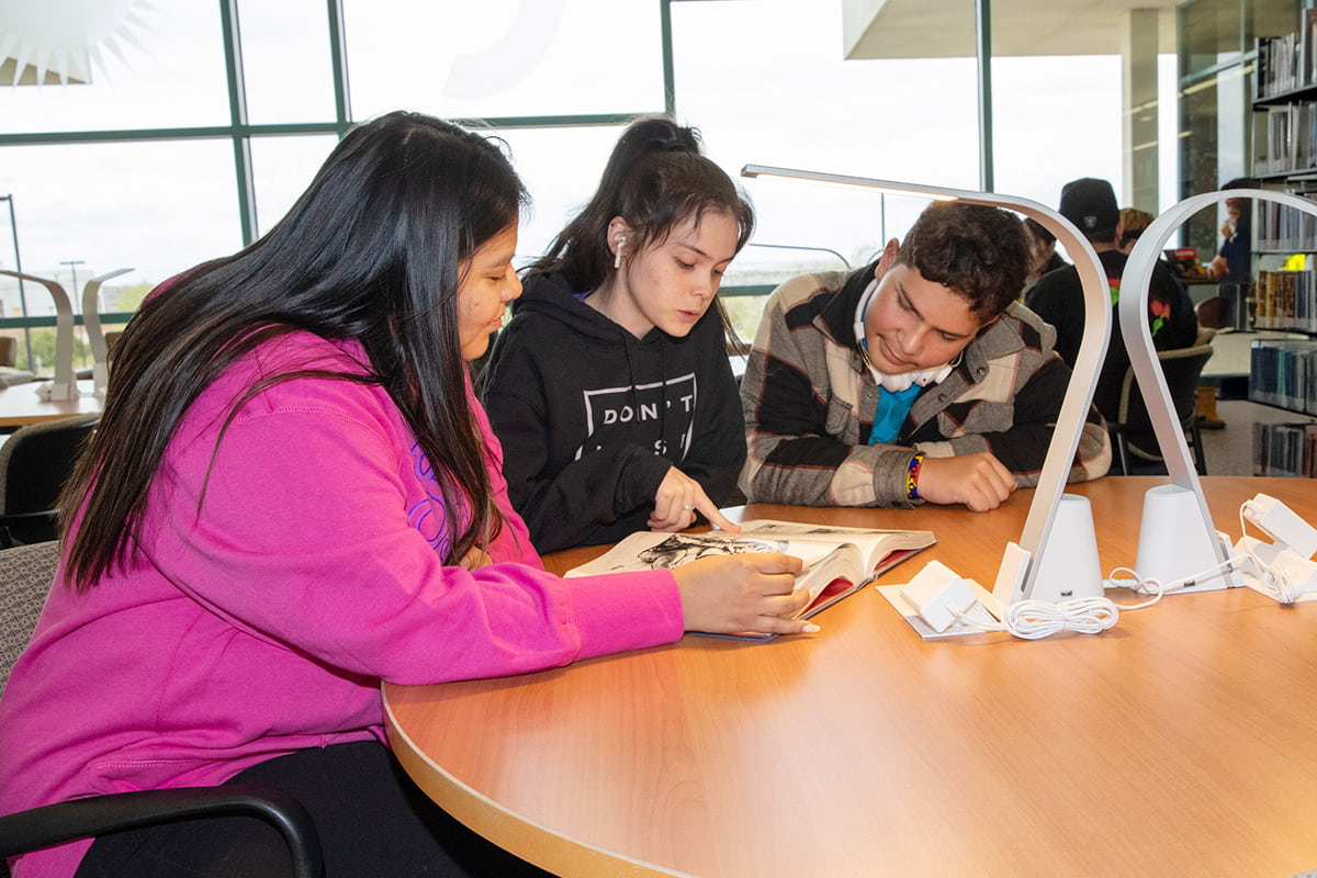 SJC Students at a table in the Library on Main Campus studying