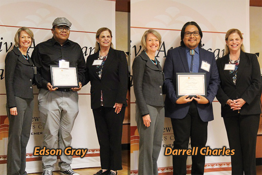 Edson Gray and Darrell Charles shown with representatives from NM Gas Company and their awards.
