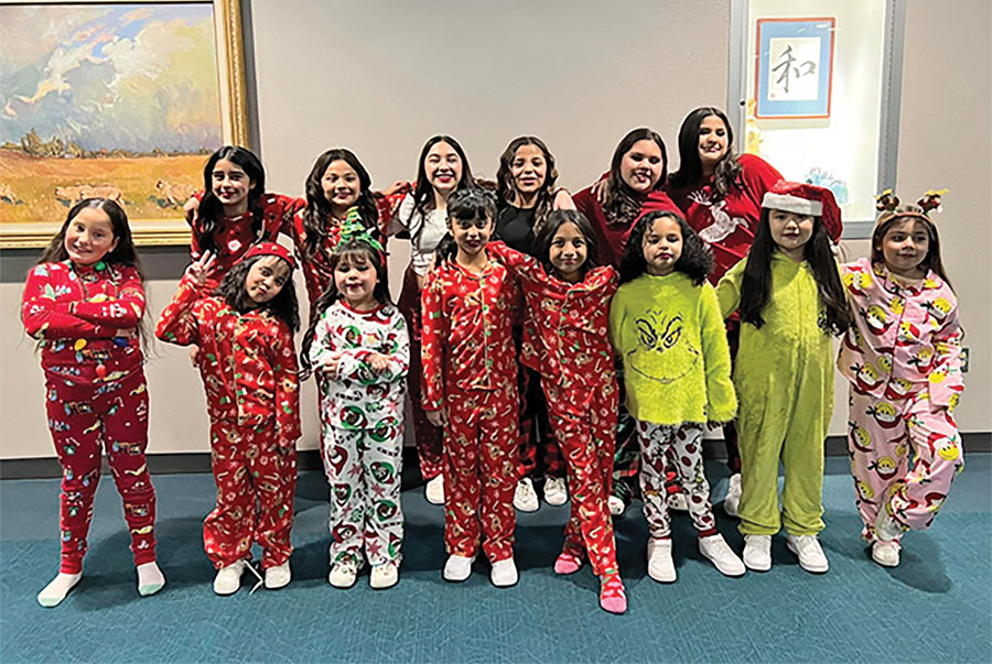 Large group of young dancers in their Christmas pajamas for the Holiday Spectacular