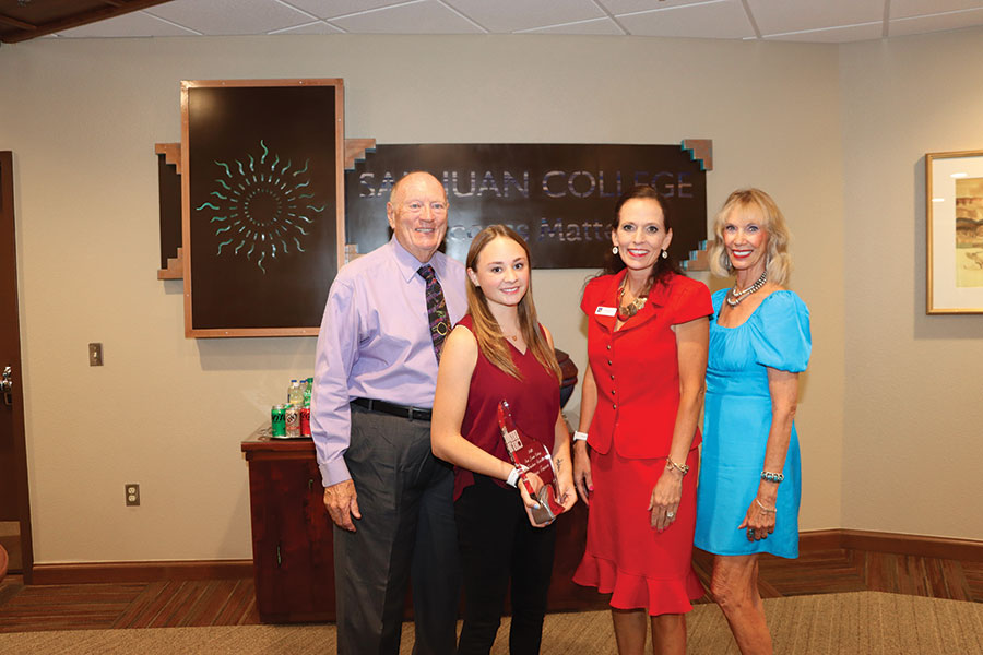 Torince Tanner was presented with her full-ride scholarship at the September board meeting. Left to right: Joe Rasor, Board Chairman; Torince Tanner, Dr. Toni Hopper Pendergrass, San Juan College President; and Gayle Dean, Director of the San Juan College Foundation.